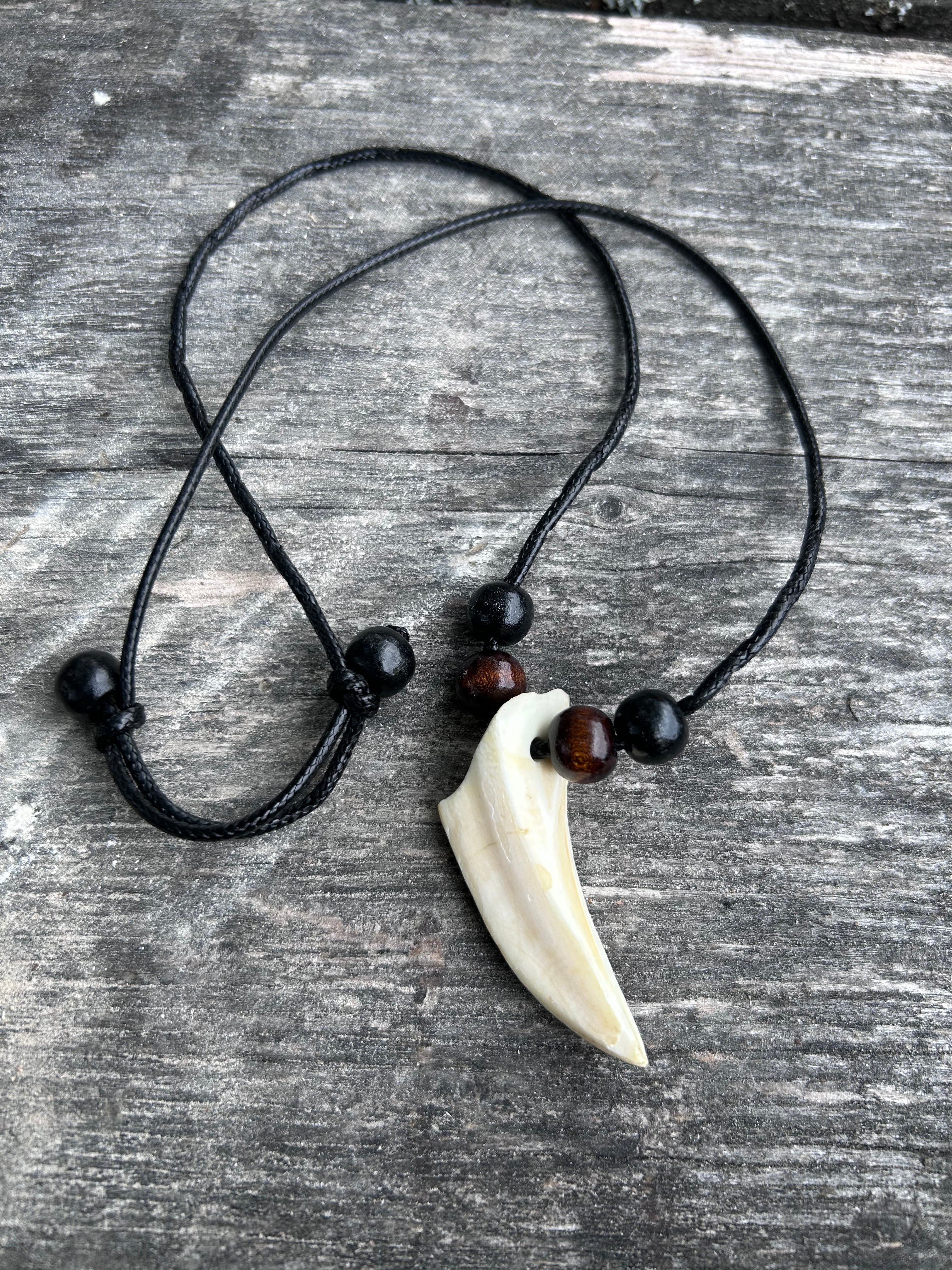 Ethical handmade bone jewelry with preserved animal bone pendant